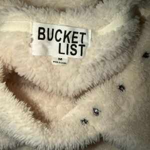 Brand new without tags. Bucket List Cream Plush Snap-Up Pullover with hood.